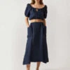 Casa RakiSOL MIDI SKIRT - NAVY -AGOLDE Shop CASA RAKI SOL MIDI SKIRT IN NAVY 20230807144732