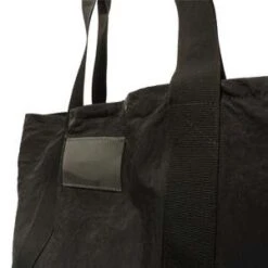 Our LegacyFLIGHT TOTE - BLACK DENSE LIQUID NYLON -AGOLDE Shop FLIGHT TOTE BLACK DENSE LIQUID NYLON 20230922043832