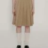 FAFAMOONPleated Raw Hem Skirt - Tan 1 FAFAMOONPleated Raw Hem Skirt - Tan -AGOLDE Shop Tan Pleated Raw Hem Skirt 20230929083920